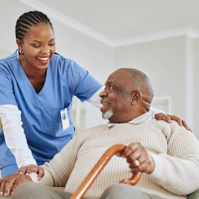 A nurse working with the patient image